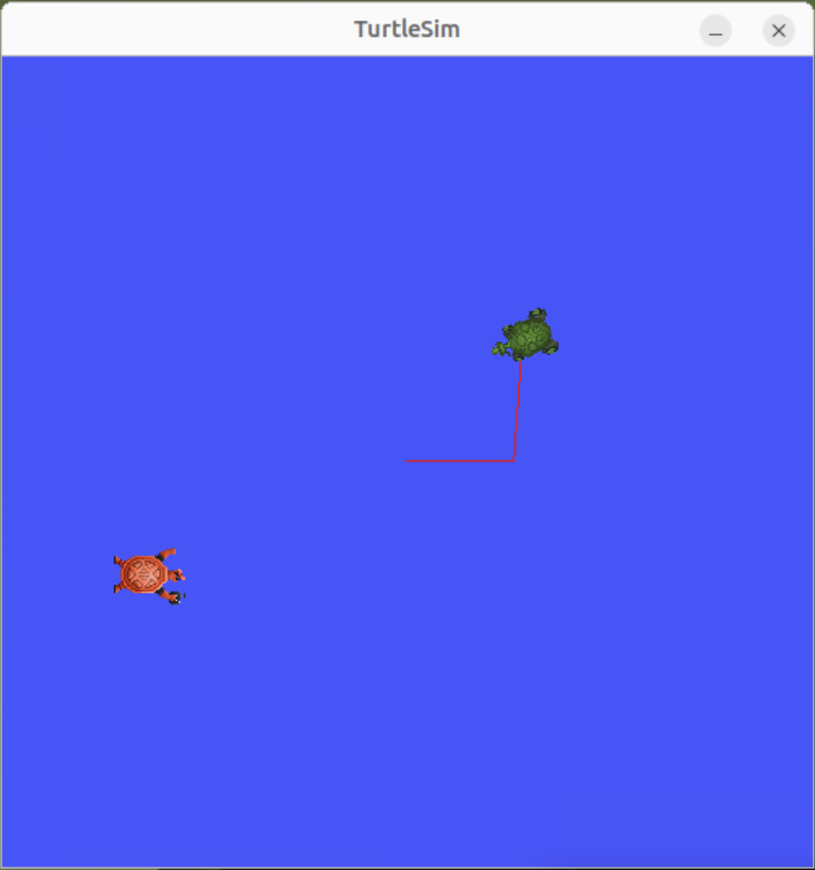 Two turtles in Turtle Sim, one spawned through /spawn, with a red trail drawn after set_pen